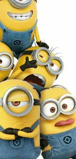 Group of playful minions in vibrant yellow overalls.