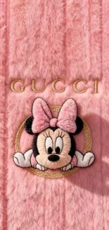 Cute pink Minnie Mouse wallpaper with luxury branding.