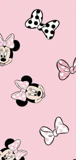 Cute Minnie Mouse wallpaper with pink background and bows.