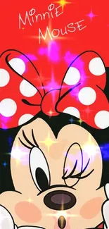 Minnie Mouse winking with a red polka dot bow.