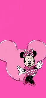 Adorable Minnie Mouse on a pink background with polka dots.