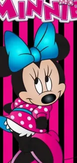 Colorful Minnie Mouse wallpaper with pink stripes and a blue bow.