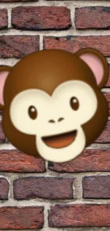 Cute monkey emoji on brick wall background.