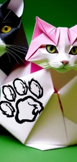 Cute origami cats on green background wallpaper.