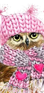 Cute owl in pink knitted hat and scarf with hearts.