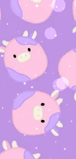 Cute pastel cow pattern wallpaper with pink cows on purple background.