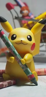 Pikachu figurine holding a crayon surrounded by colorful art supplies.