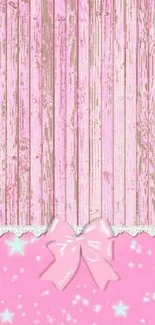 Pink wallpaper with bow, lace, and sparkles.