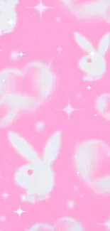 Pink wallpaper with bunnies and hearts, playful design.