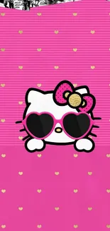 Cute cartoon cat with heart sunglasses on a pink background.