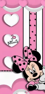 Cute pink wallpaper with cartoon character and hearts.