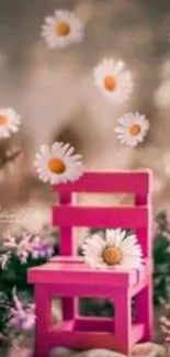 A pink chair with white daisies and floral background.