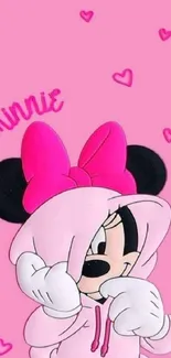 Pink character in hoodie with hearts on wallpaper.