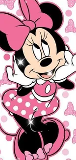 Pink cartoon character with polka dots and bows.