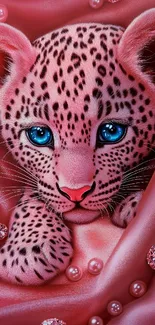 A cute pink leopard with blue eyes among shiny jewels.