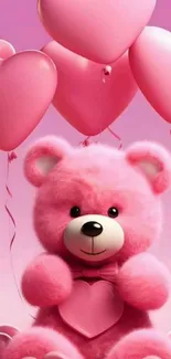 Cute pink teddy bear with heart balloons.