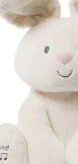 Cute cream-colored plush bunny toy with embroidery.