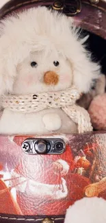 Plush doll in cozy winter box with pastel pink accents.