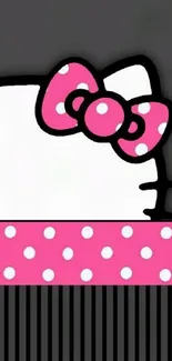 Cute kitty wallpaper with pink polka dot bow.