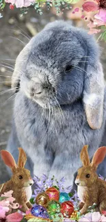 Gray rabbit with floral border and Easter eggs on a whimsical wallpaper.