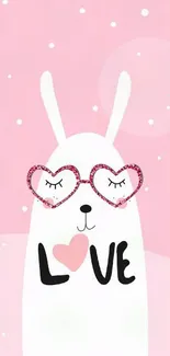 Cute rabbit with heart glasses and love text on pink background.