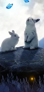 Two white rabbits on a rock under moonlit sky with blue butterflies.