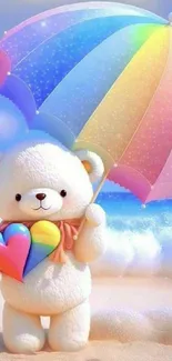 A cute bear with a rainbow heart and umbrella on a beach.