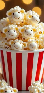 Red-striped bucket filled with sheep-shaped popcorn.