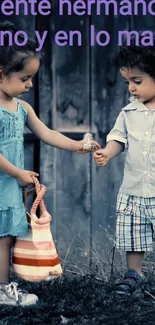 Cute siblings sharing a moment outdoors in blue attire.