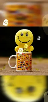 Yellow smiley face plush toy in a mug with ghost emojis on dark background.