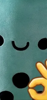 Cute teal plush with smiley face and emoji gesture in wallpaper.