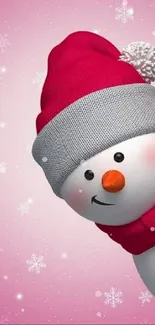 Cheerful snowman on pink snowy background with red hat.