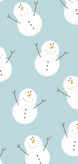 Cute snowmen on a light blue background wallpaper.