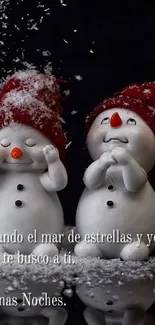 Two cute snowmen with red hats and snow, winter background.