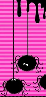 Cute black spiders on pink striped background with black drips.