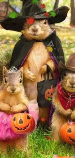 Squirrels in cute Halloween costumes on a grassy field.