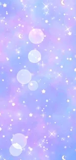 Cute starry sky wallpaper with pastel stars and moons.