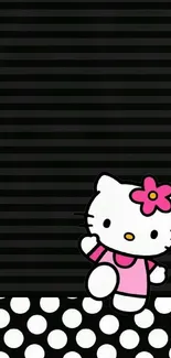 Hello Kitty with black stripes and polka dots wallpaper.