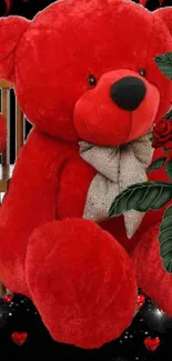 Red teddy bear and roses on a black background wallpaper.