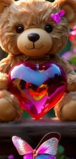 Teddy bear holding a pink heart with butterflies around.