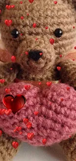 Teddy bear with pink heart and red hearts wallpaper.