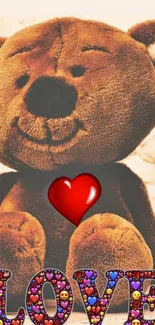 Cute teddy bear with heart and LOVE text wallpaper.