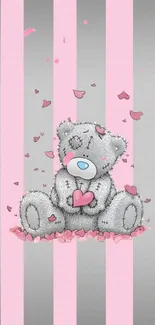 Cute teddy bear with pink heart on striped wallpaper.