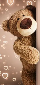 Cute teddy bear with hearts mobile wallpaper.