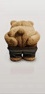 Smiling teddy bear with pants mobile wallpaper.