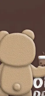 Cute teddy bear with coffee on brown background wallpaper.