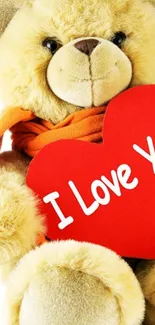 Cute teddy bear with heart saying 'I Love You'.