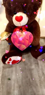 Cuddly teddy bear with a red heart design on a wooden floor background.