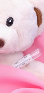 Adorable teddy bear with pink background and thermometer.