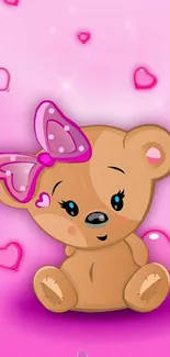 Cute teddy bear with pink hearts on pink background.